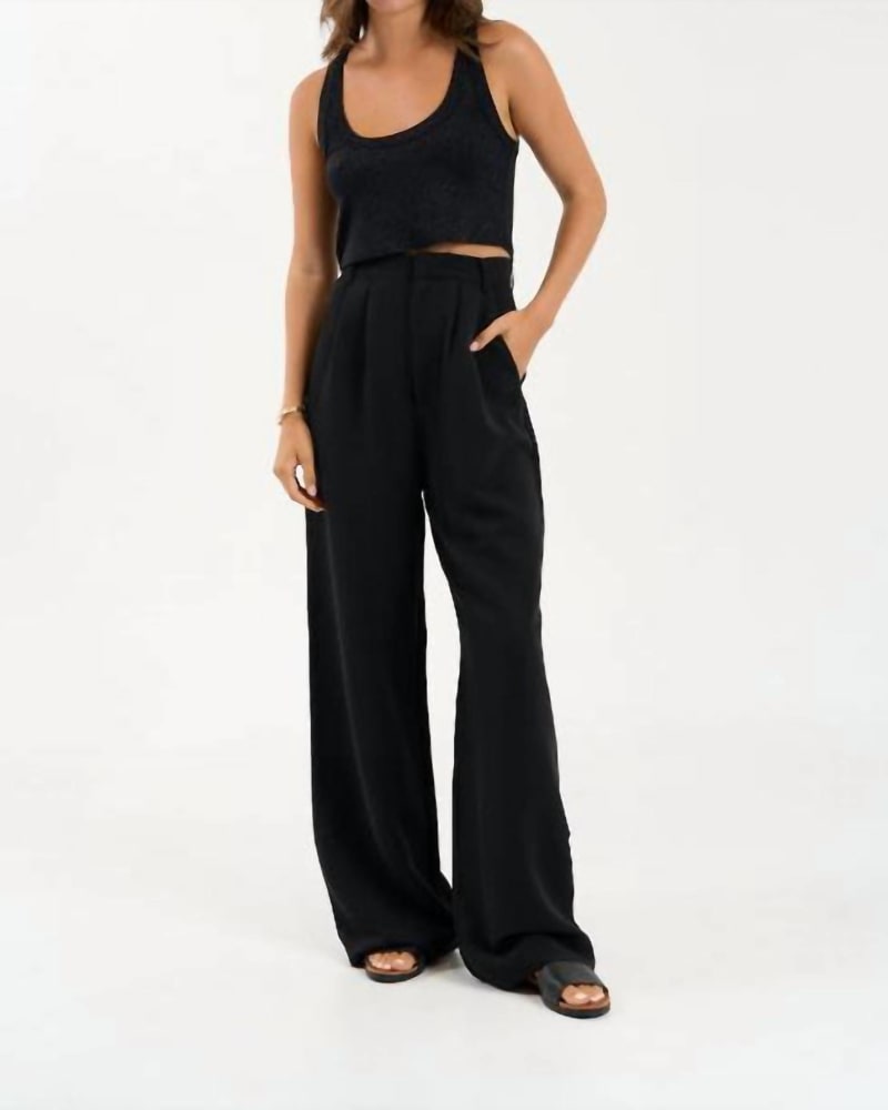 Front of a model wearing a size large Gentry Trouser - in Black in Black by sundays. | dia_product_style_image_id:339596